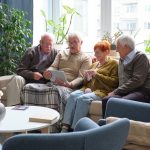 Senior people watching movie on digital tablet